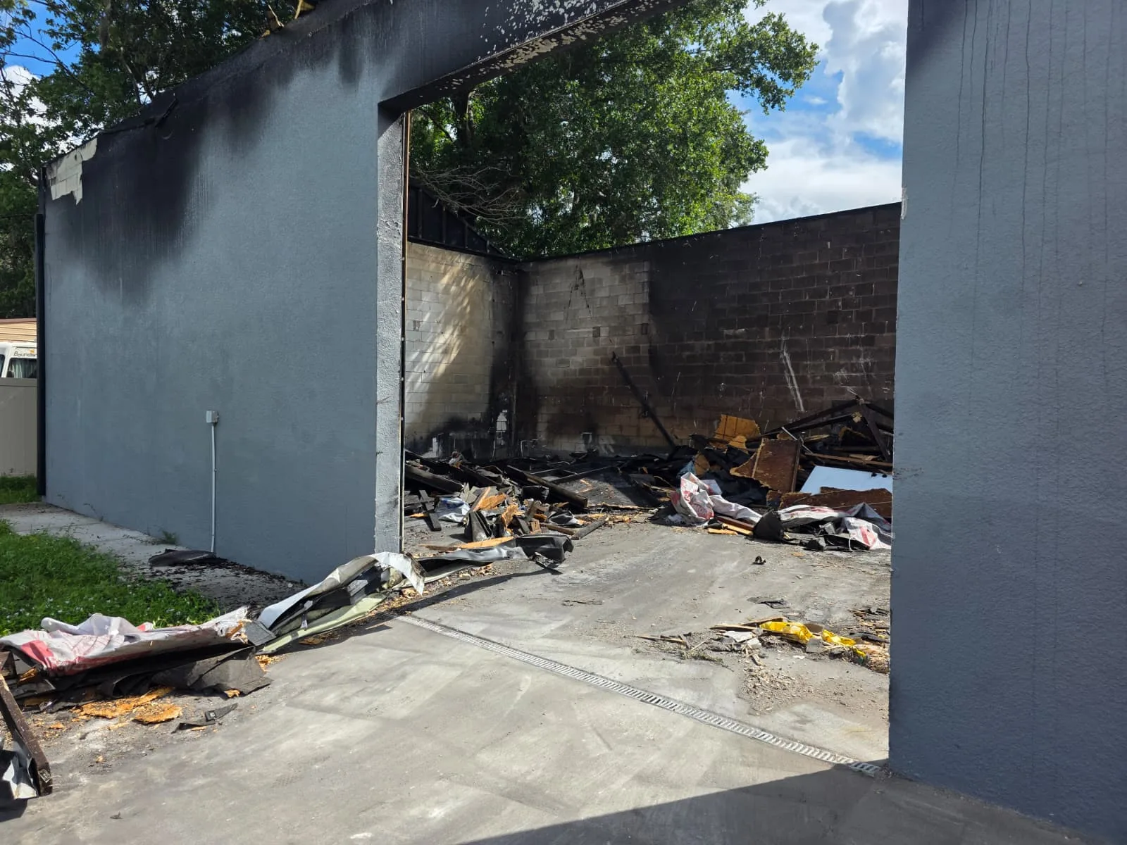 Commercial demolition area with exterior walls retained