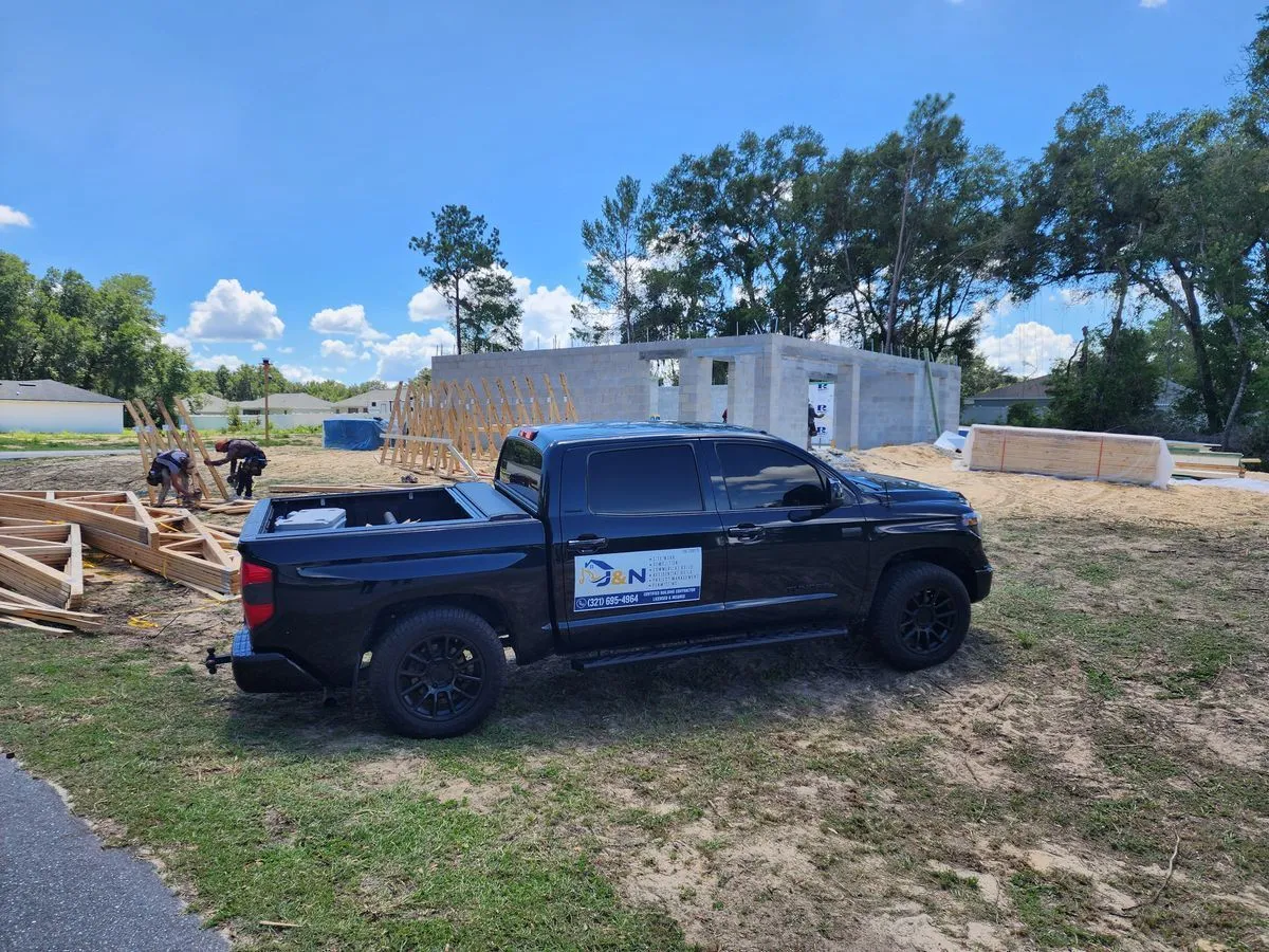 J&N StructureWorks truck at an active construction site in Central Florida
